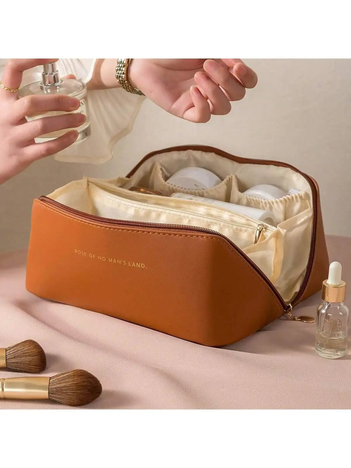 Women's PU leather pillow waterproof portable travel makeup bag,